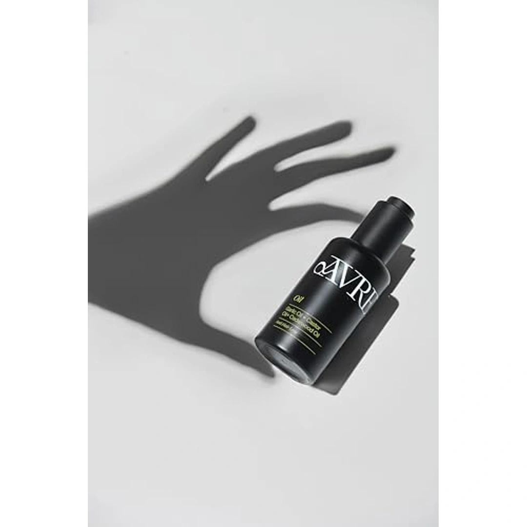 زيت الشعر بالثوم والخروع وخشب الأرز من افريل - 50 مل