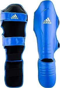 Adidas واقي الساق الرياضي - مقاس M - أزرق/أبيض