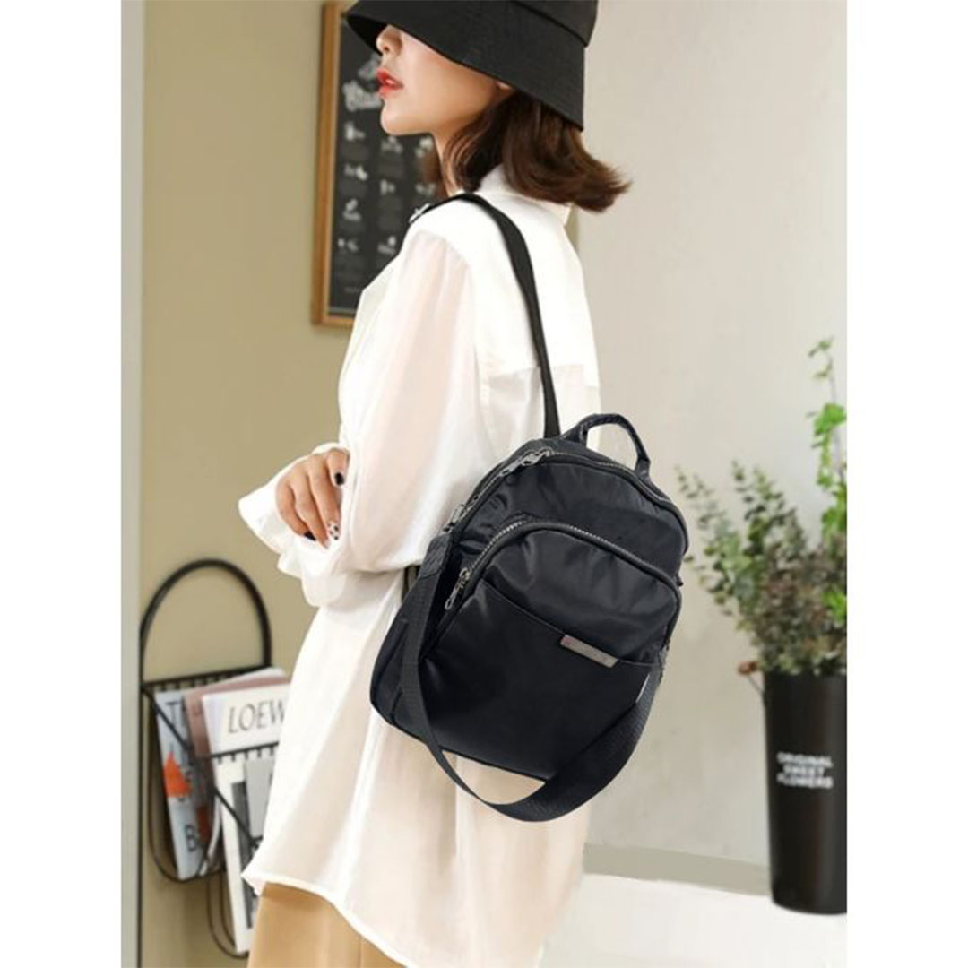 شنطة حريمي جلد جانبية وللظهر - أسود