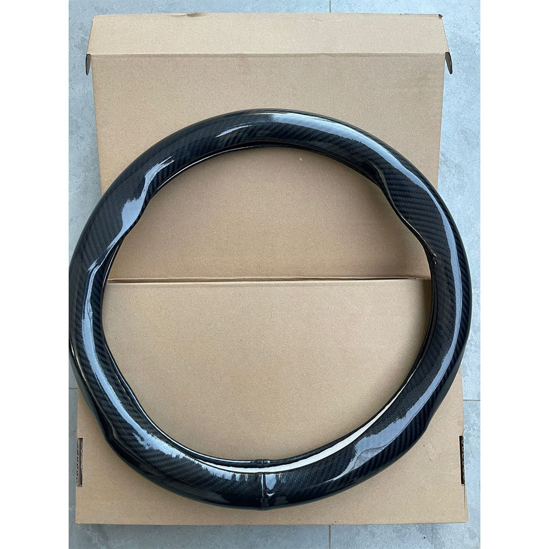 غطاء طارة دركسيون من الكربون - أسود