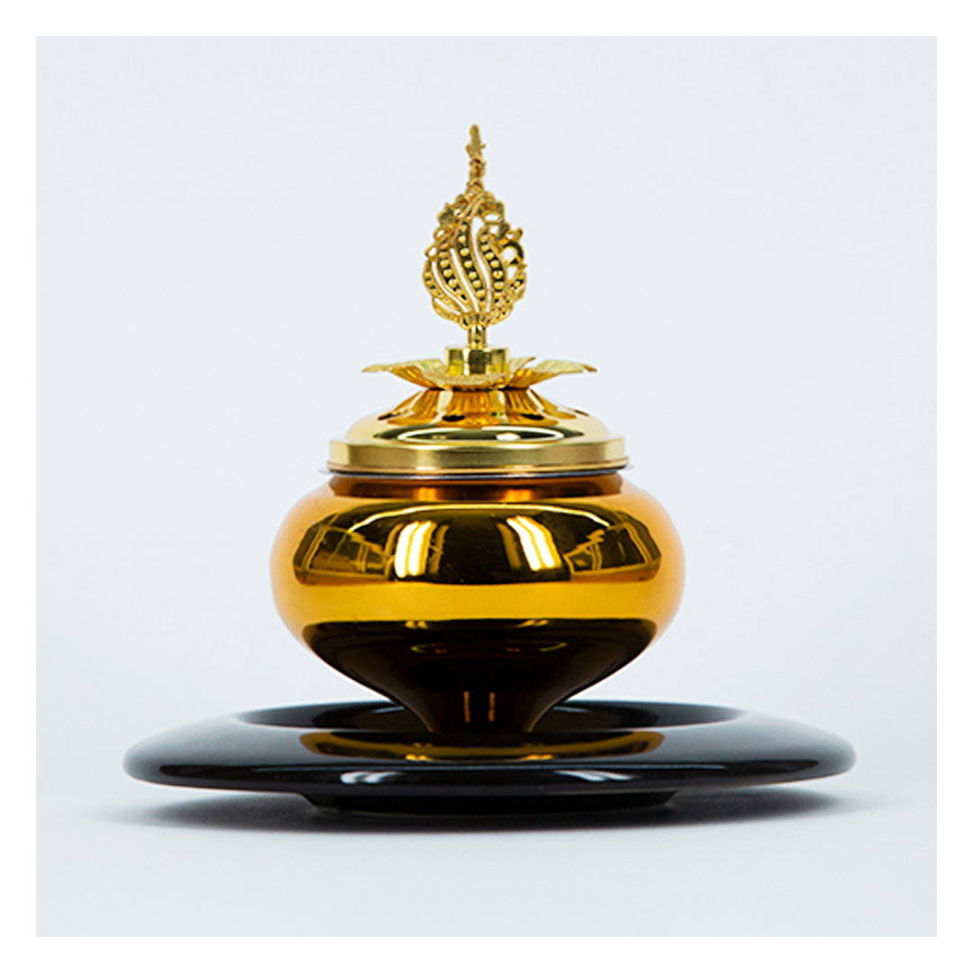 مبخرة معدنية بقاعدة خزفية - أسود/ ذهبي