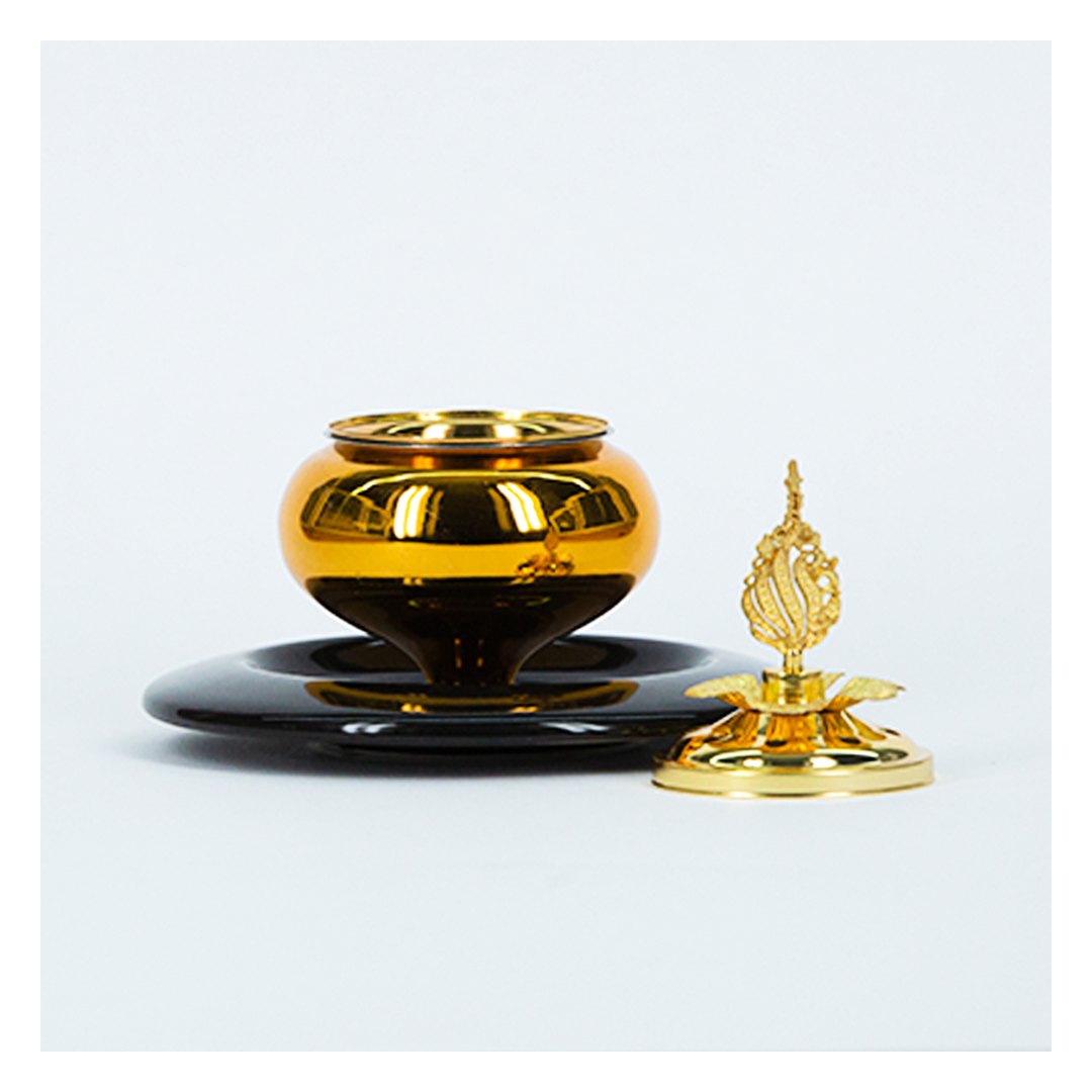 مبخرة معدنية بقاعدة خزفية - أسود/ ذهبي