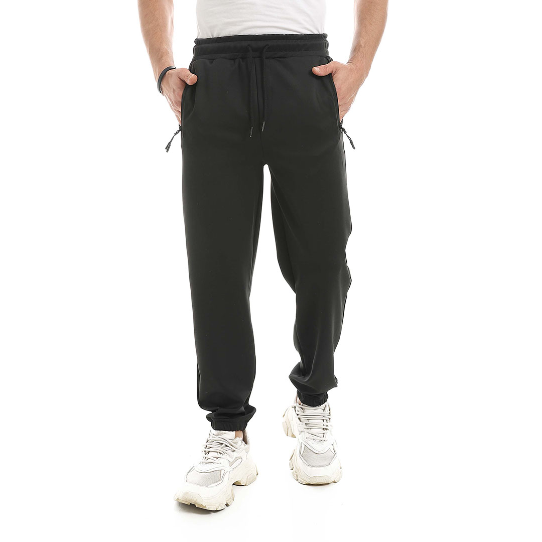 بنطلون بجيب بسوستة وأساور مرنة رجالي