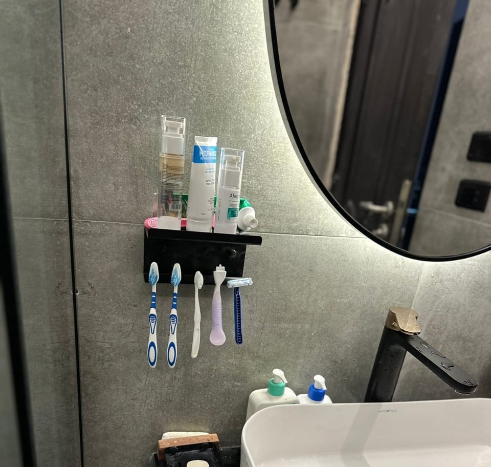 منظم فرش بالرف ستانلس ستيل - 16 سم - أسود